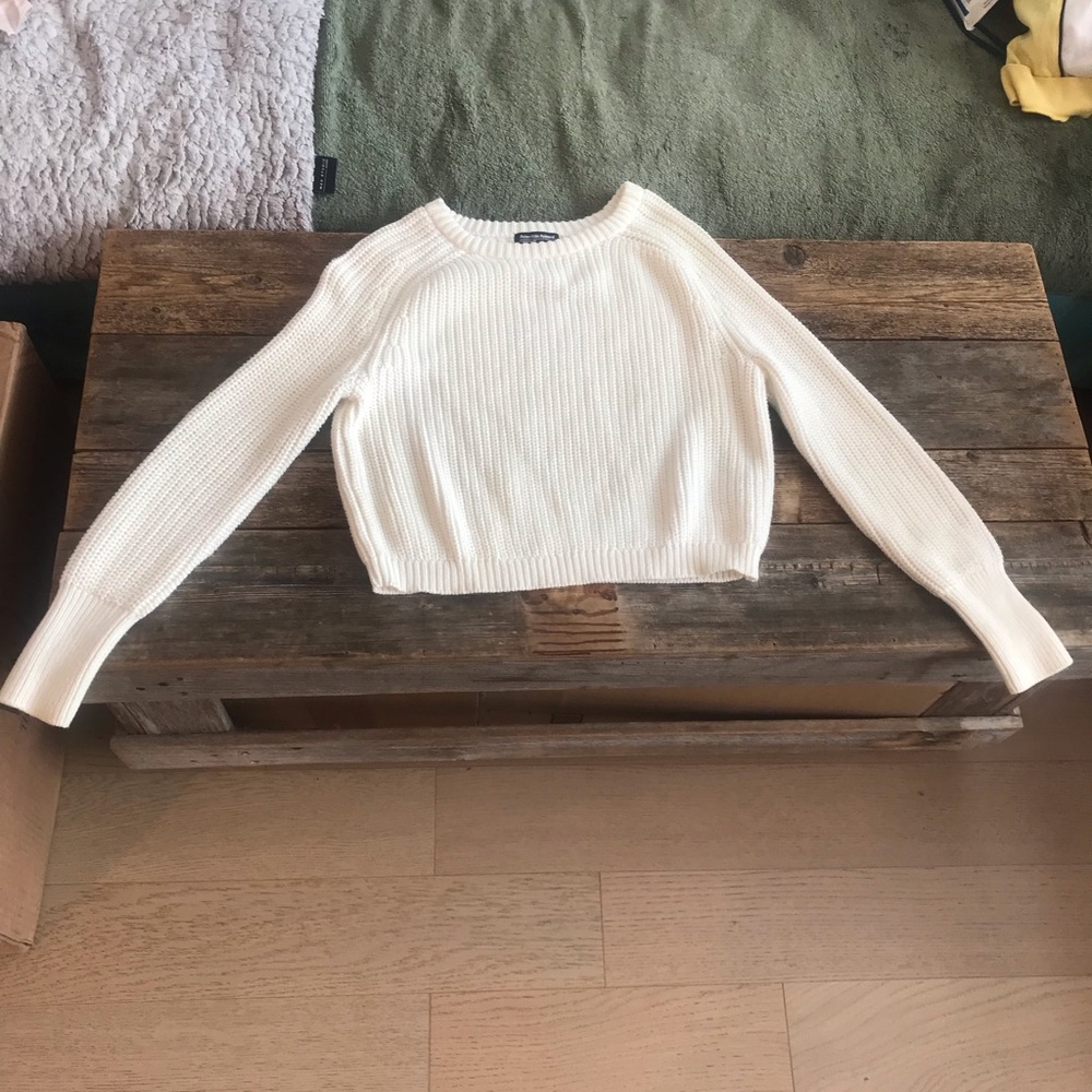 American apparel white sweater in size medium.